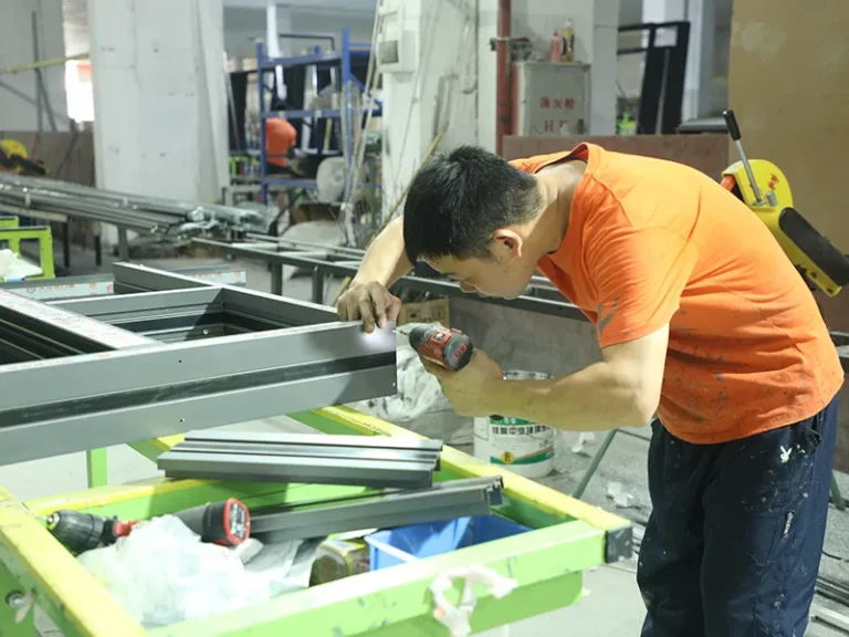 Workers installing doors and windows-3